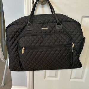 Black Quilted Women's carry-on bag EUC